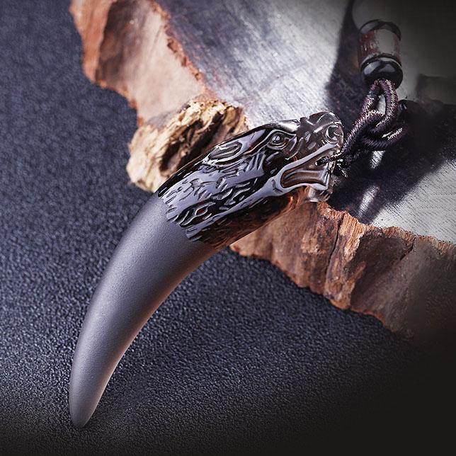 Carved Obsidian Wolf Fang - Wyvern's Hoard
