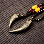 Carved Obsidian Wolf Fang - Wyvern's Hoard