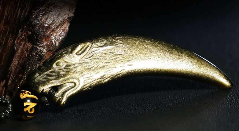 Carved Obsidian Wolf Fang - Wyvern's Hoard