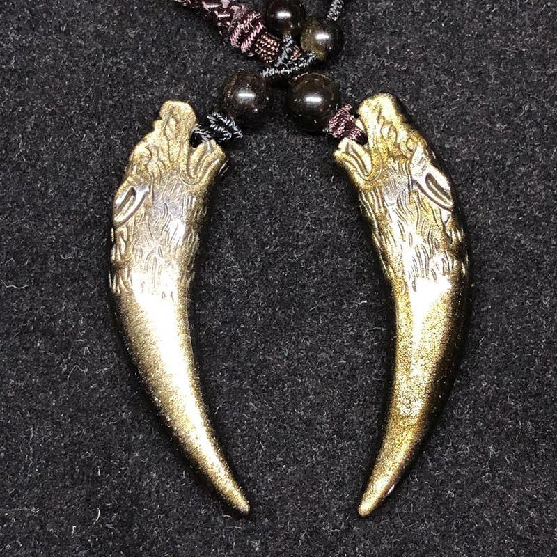 Carved Obsidian Wolf Fang - Wyvern's Hoard