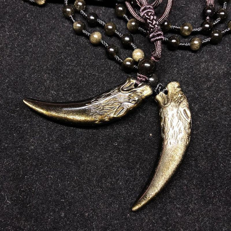 Carved Obsidian Wolf Fang - Wyvern's Hoard